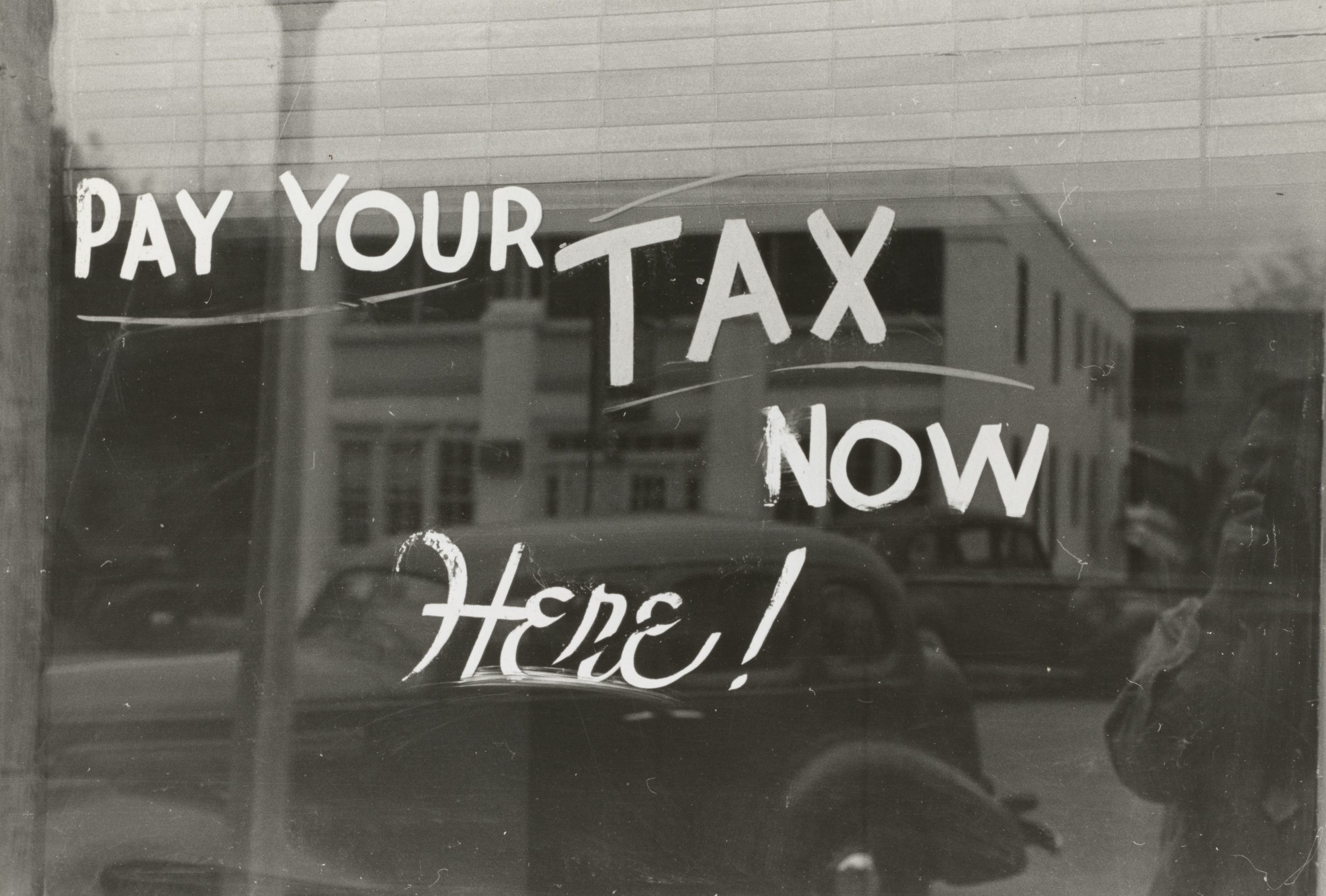 Tax sign for real estate tax article